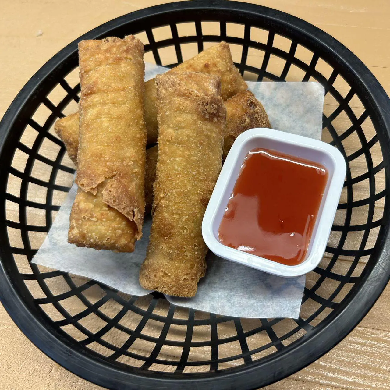 ried Spring Rolls presents crispy, deep - fried spring rolls at Asian Wok, a Chinese restaurant in Port Lavaca